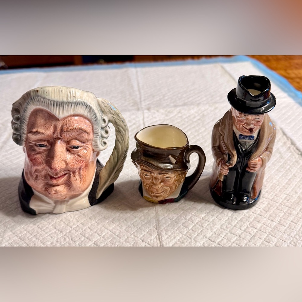 Set of three Royal Dalton Toby mugs.